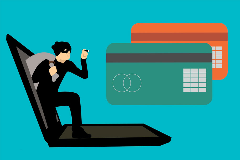 platby na internetu: hacker se snaží získat informace z platební karty